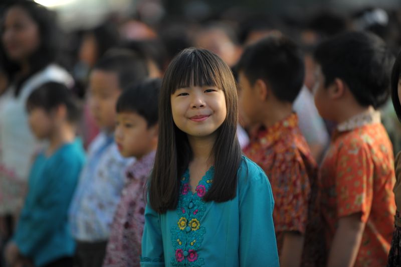 Asian children in a caring community environment